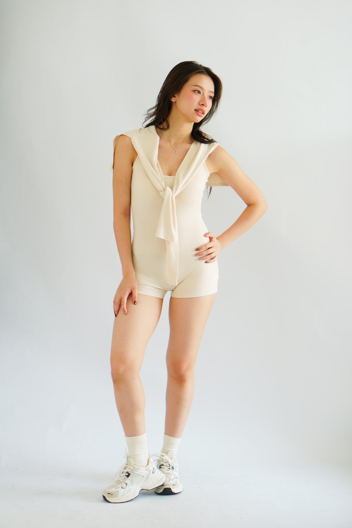 Lovi Padded Jumpsuit with Self Tied Scarf in Beige