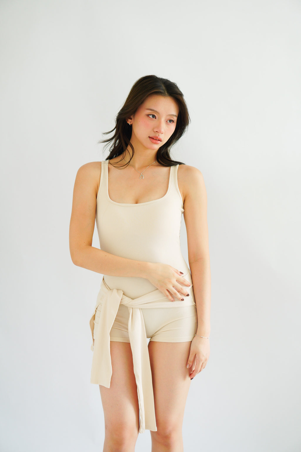 Lovi Padded Jumpsuit with Self Tied Scarf in Beige
