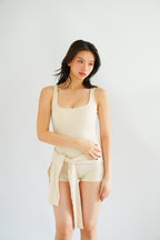 Lovi Padded Jumpsuit with Self Tied Scarf in Beige