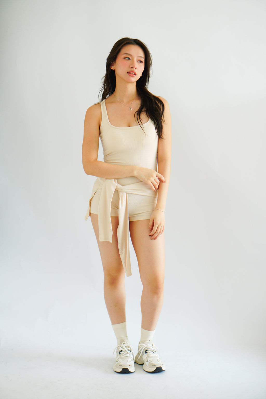 Lovi Padded Jumpsuit with Self Tied Scarf in Beige