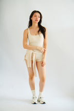 Lovi Padded Jumpsuit with Self Tied Scarf in Beige
