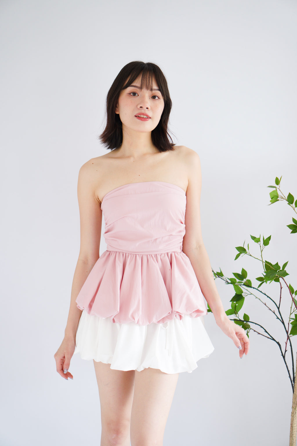 Frenchie Ruched Peplum Tube Top in Pink