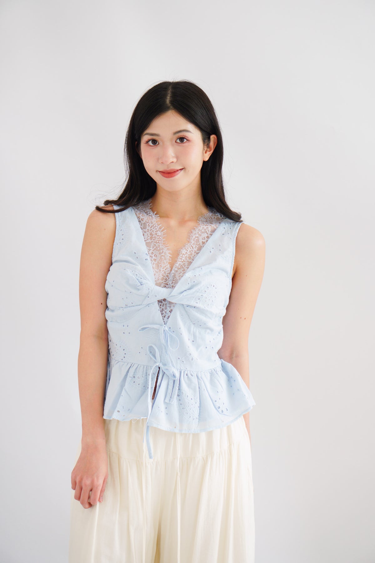 Jorie Lace V Neck Peplum Top in Blue