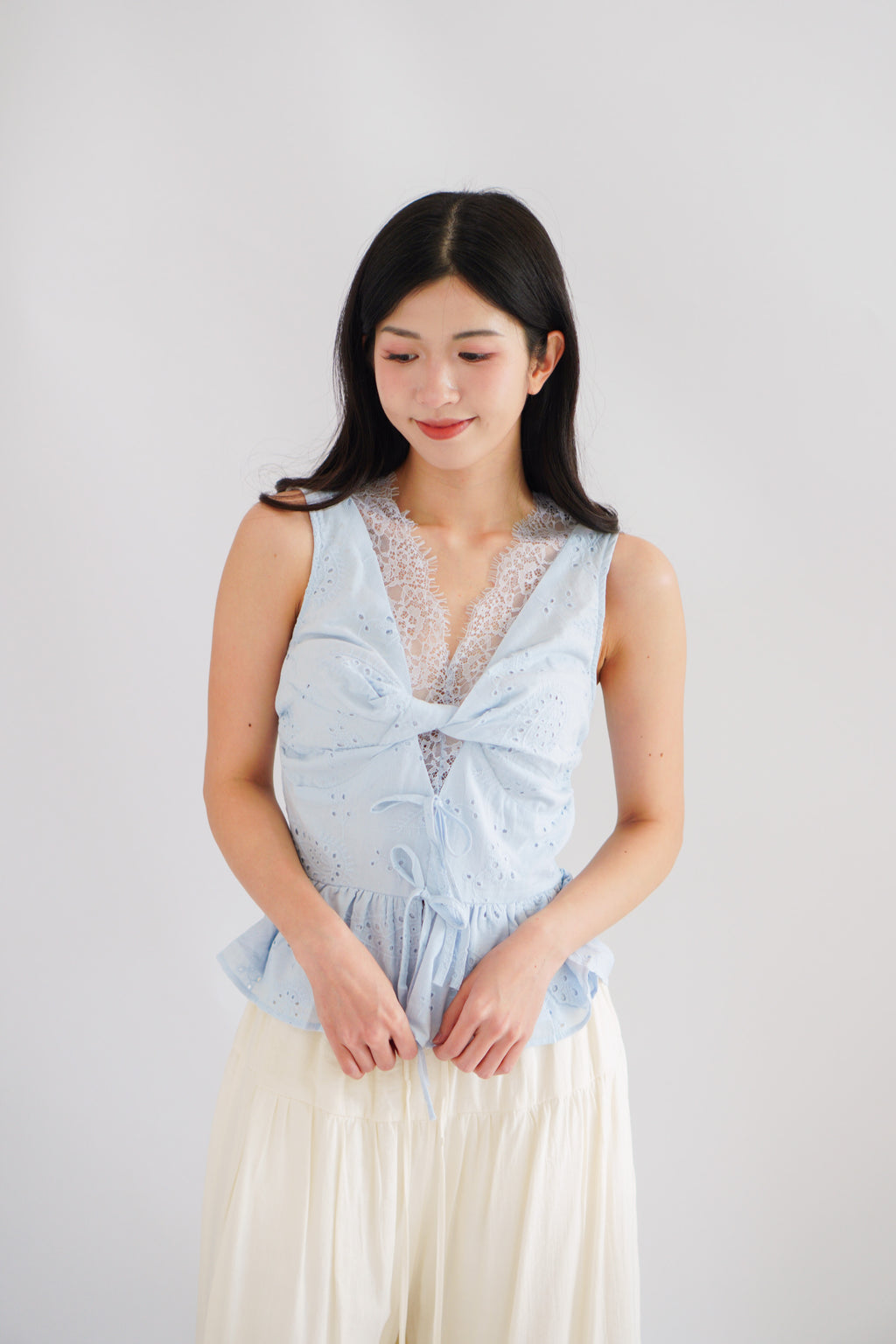 Jorie Lace V Neck Peplum Top in Blue