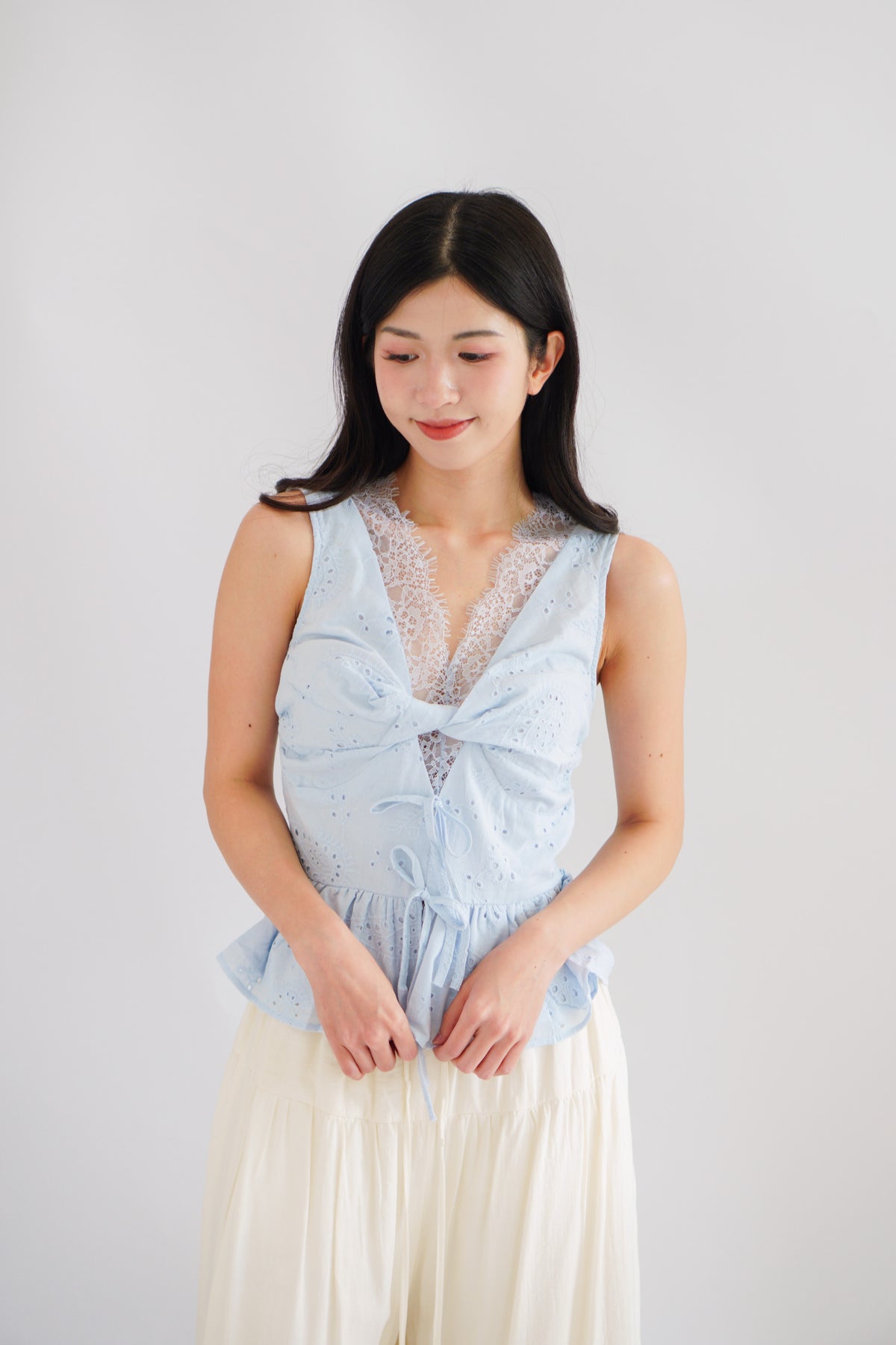 Jorie Lace V Neck Peplum Top in Blue
