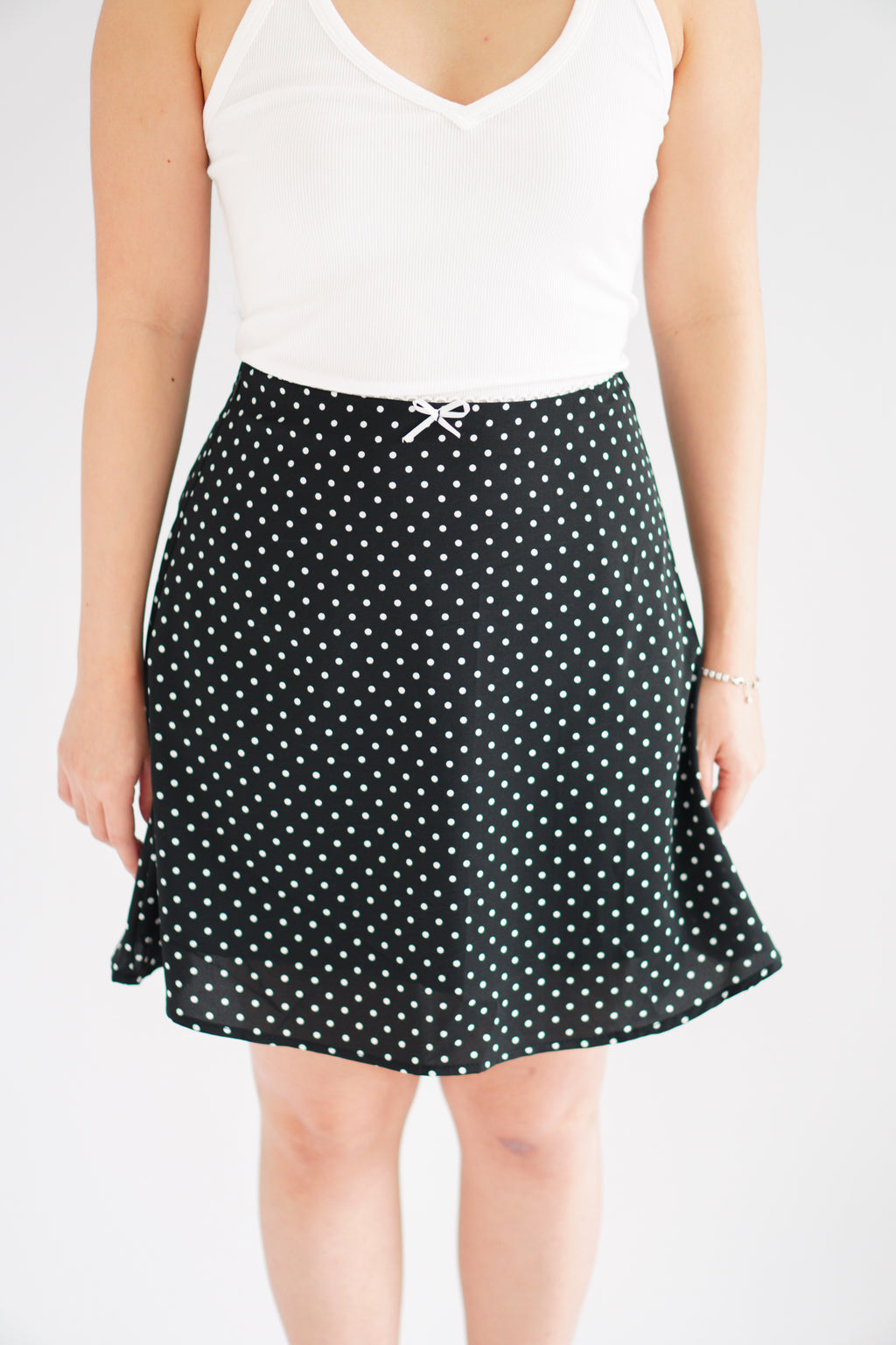 Clovie Polkadot Mini Skirt in Black